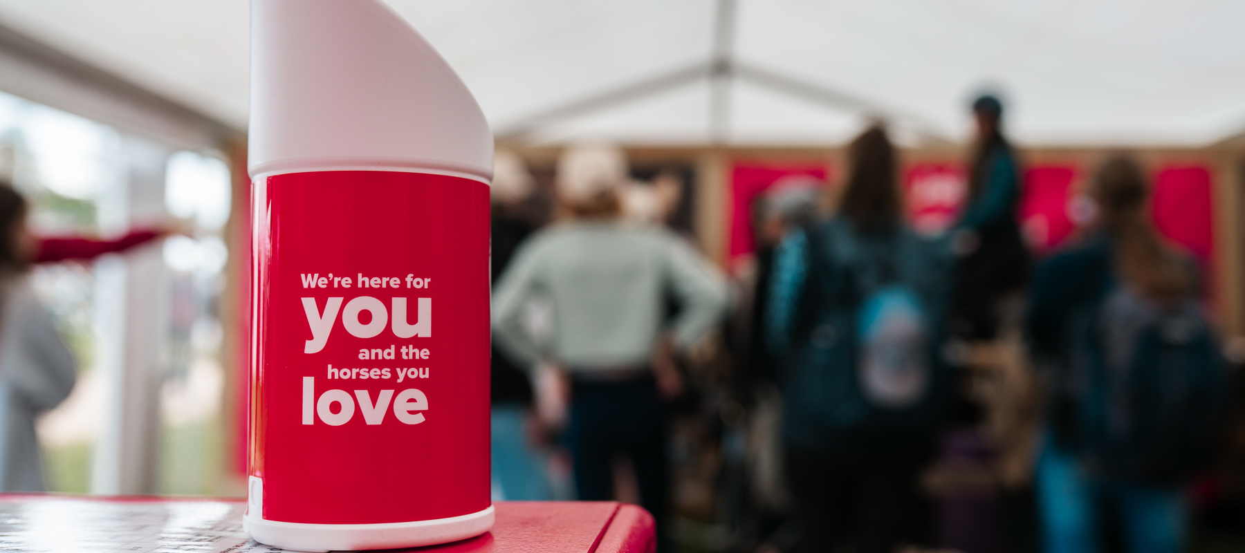 BHS donation tin on a desk at an event