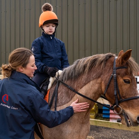 Child on a pony