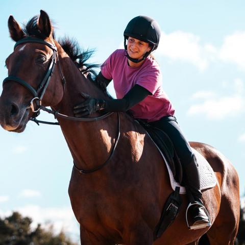 Rider Stroking Horse Smiling